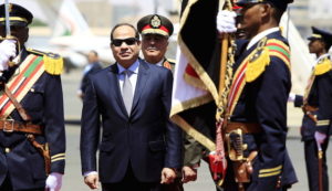 Egyptian President Abdel Fattah al-Sisi (C) inspects a guard of honour upon his arrival at Khartoum Airport, ahead of a signing ceremony of an Agreement on Declaration of Principles between Sudan, Egypt and Ethiopia on the Grand Ethiopian Renaissance Dam Project, in Khartoum March 23, 2015.  The leaders of Egypt, Ethiopia and Sudan signed a cooperation deal on Monday over a giant Ethiopian hydroelectric dam on a tributary of the river Nile, in a bid to ease tensions over regional water supplies. The leaders said the "declaration of principles" would pave the way for further diplomatic cooperation on the Grand Renaissance Dam, which has stirred fears of a regional resource conflict. No details of the agreement were immediately released. REUTERS/ Mohamed Nureldin Abdallah - RTR4UI20
